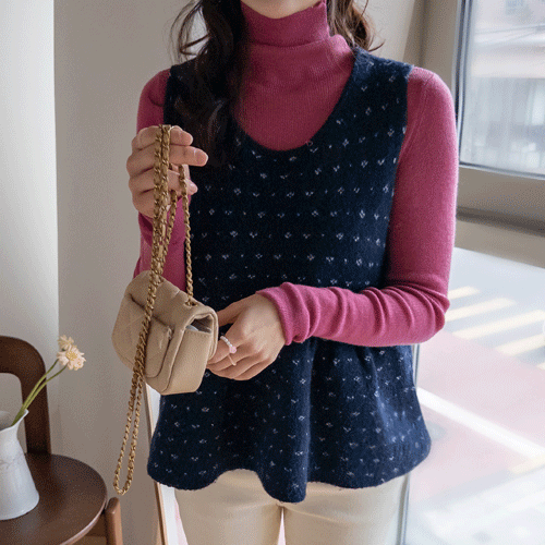 ロジアラブリーフラワーパターン裾ラッフルベストニット [size:F(55～66)]